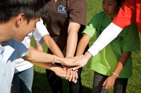 photo all hands in a circle for web